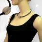 Preview: Kette 32x26mm Rillenolive transparent-matt mit goldfarben Kunststoff 6mm Vollgummi 42cm