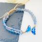 Preview: Gewebtes Kristallarmband mit Schmetterling