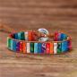 Preview: Mehrfarbiges Jaspis-Wickelarmband „Farbenpfad“ mit Metallornament 7 Chakren
