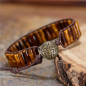 Preview: Braunes Manschettenarmband mit Tigerauge – Lederarmband im Boho Stil