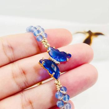 Gewebtes Kristallarmband mit Schmetterling