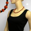 Kette 10-12mm Perlen Kunststoff orange-schwarz-marmoriert 50cm