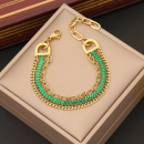 Goldfarbenes Edelstahl-Armband mit grünen Zirkonia & Gliederdesign – verstellbar